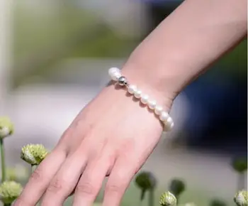 

7.5"9-10MM NATURAL SOUTH SEA GENUINE WHITE ROUND PEARL BRACELET