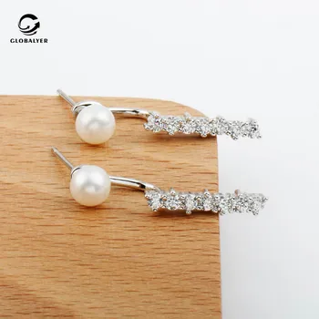 

A two-ear earring Korean S925 sterling silver INS simple natural freshwater pearl earrings Silver earring Free shipping 390