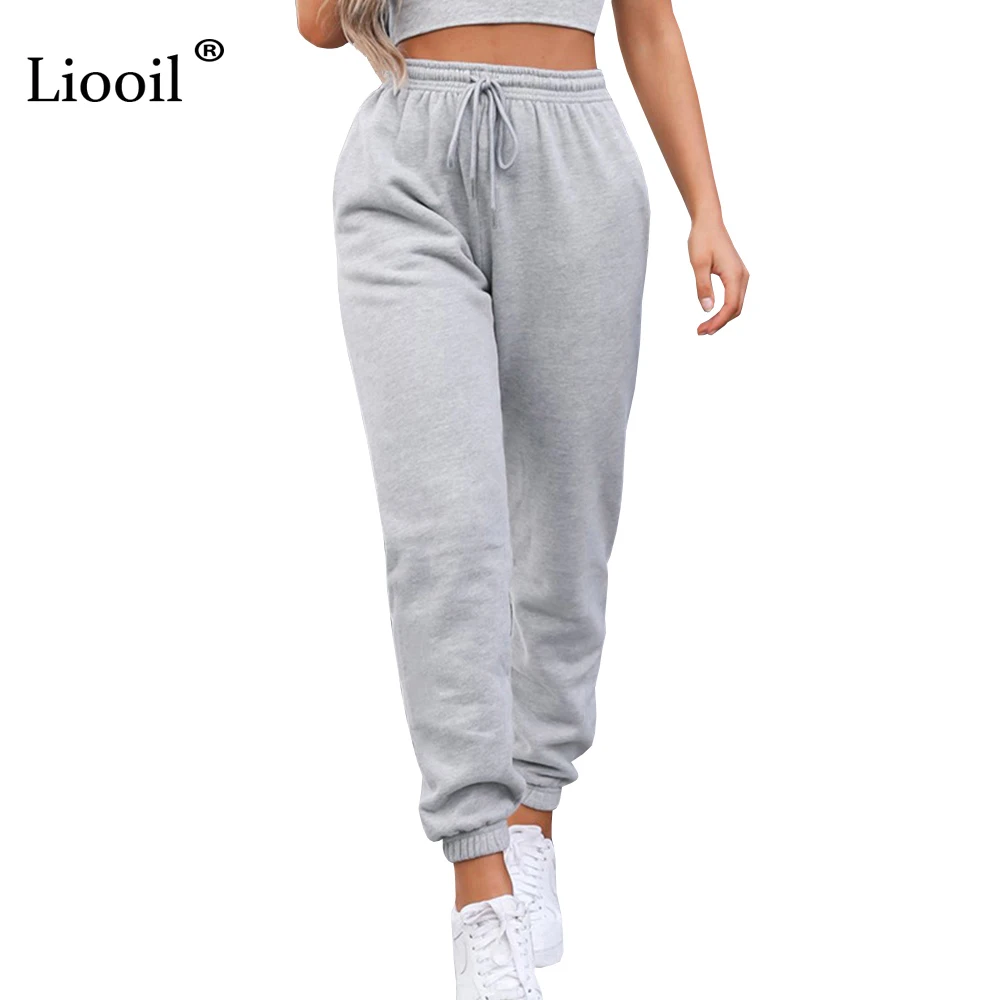 Liooil Sexy de cintura alta polar holgado Pantalones con bolsillo 2021 Otoño Invierno negro blanco Joggers holgados de las mujeres pantalones de sudor