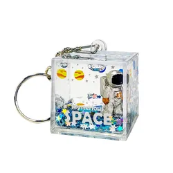 Creative New Bag Accessories Key Chain Liquid Quicksand Space Man Phone Charm Purses Backpack Ornament Couple Gifts Keychains