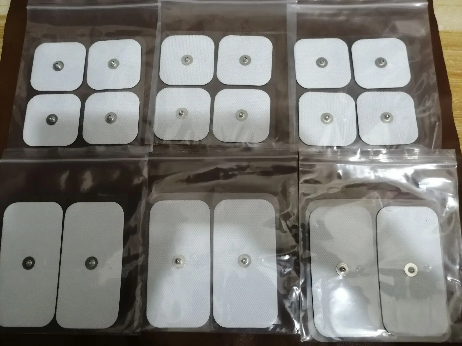 Self Adhesive Electrode Pad Electrodes 18pcs 5x5cm 5x10cm for Tens Compex Electrical Stimulator Dual Snap electrode pads