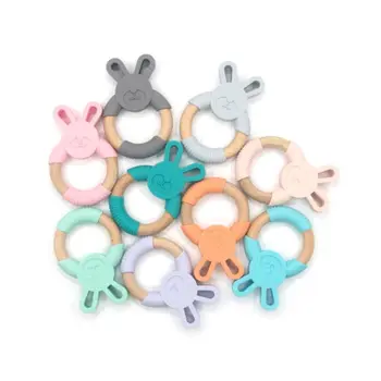 

Newborn Kids Bite Toy Infants Nursing Accessories Baby Teether Cartoon Rabbit Shape Silicone Wooden Ring Toys