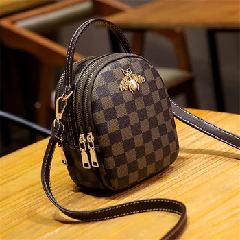 

Luxury fashion crossbody bag high quality leather shoulder bag with headphone cabe hold wild mini handbag