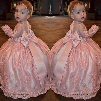 

Modest Long Sleeves Pink Flower Girl Dresses Princess Crew Neck Lace Appliques With Big Bow Sash Holy Communion Dress Wear
