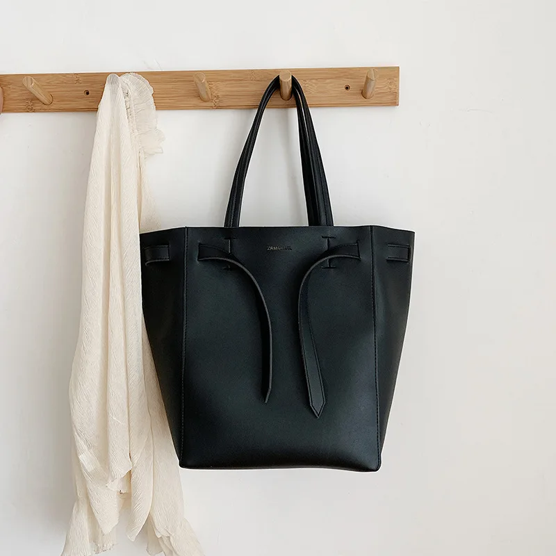 

2019 Autumn New Style WOMEN'S Bag Hand British Style WOMEN'S Bag Pu Solid Color Bucket Bag Simple Drawstring Shoulder Bag Bag
