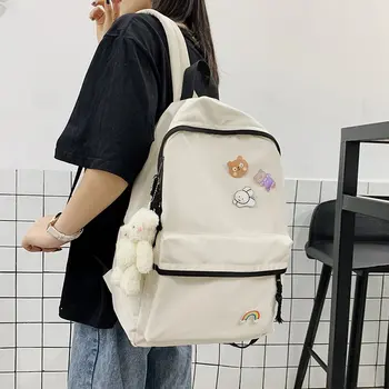 

Woman's backpack Japanese ins college style campus schoolbag high school student schoolbag cute cartoon badge girls backpack