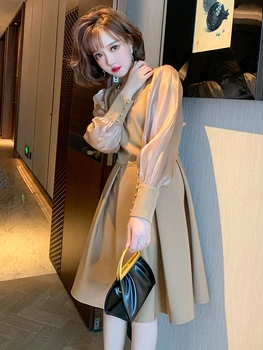 

Temperament round collar stitching gloss sleeves show thin big waist skirt dress female 2020 new autumn and winter