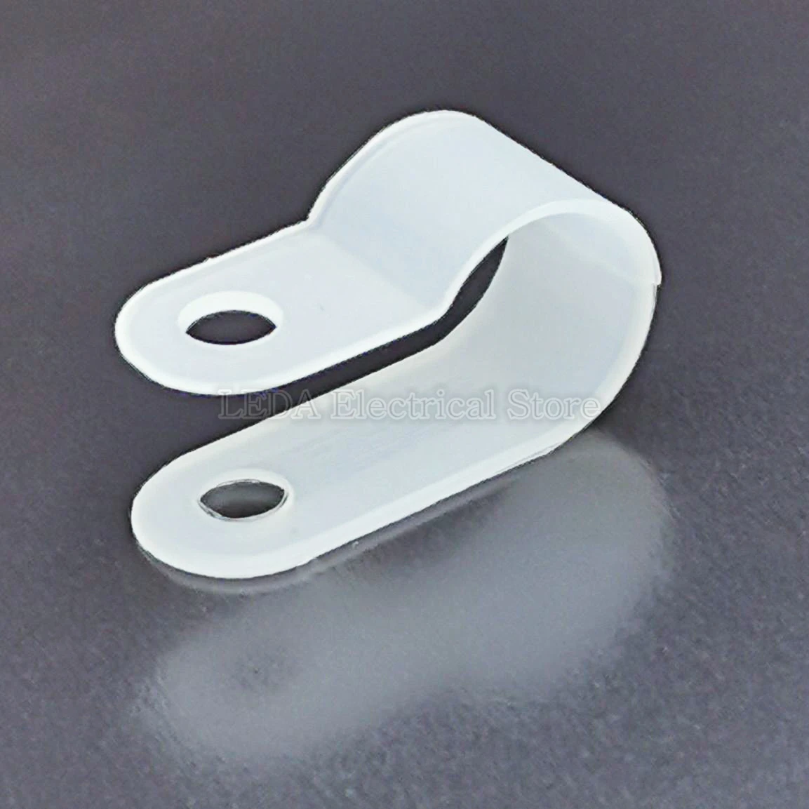 https://ae01.alicdn.com/kf/H6380fd76862d4280a7a21db8a88118f6U/Serre-c-bles-en-nylon-de-type-R-clips-en-plastique-P-attaches-de-tuyaux-noirs.jpg