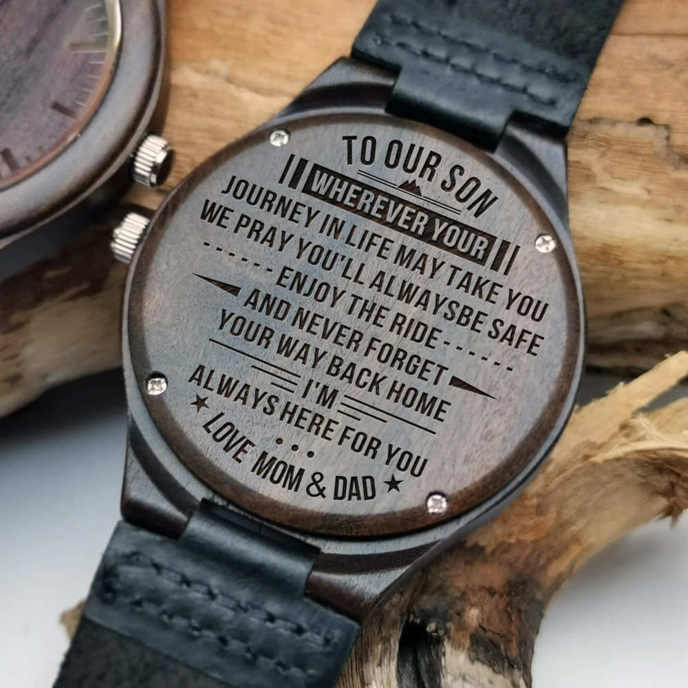 

Mom and Dad give son a wood watch sculpting contents of the night light pointer to give his son a graduation birthday present