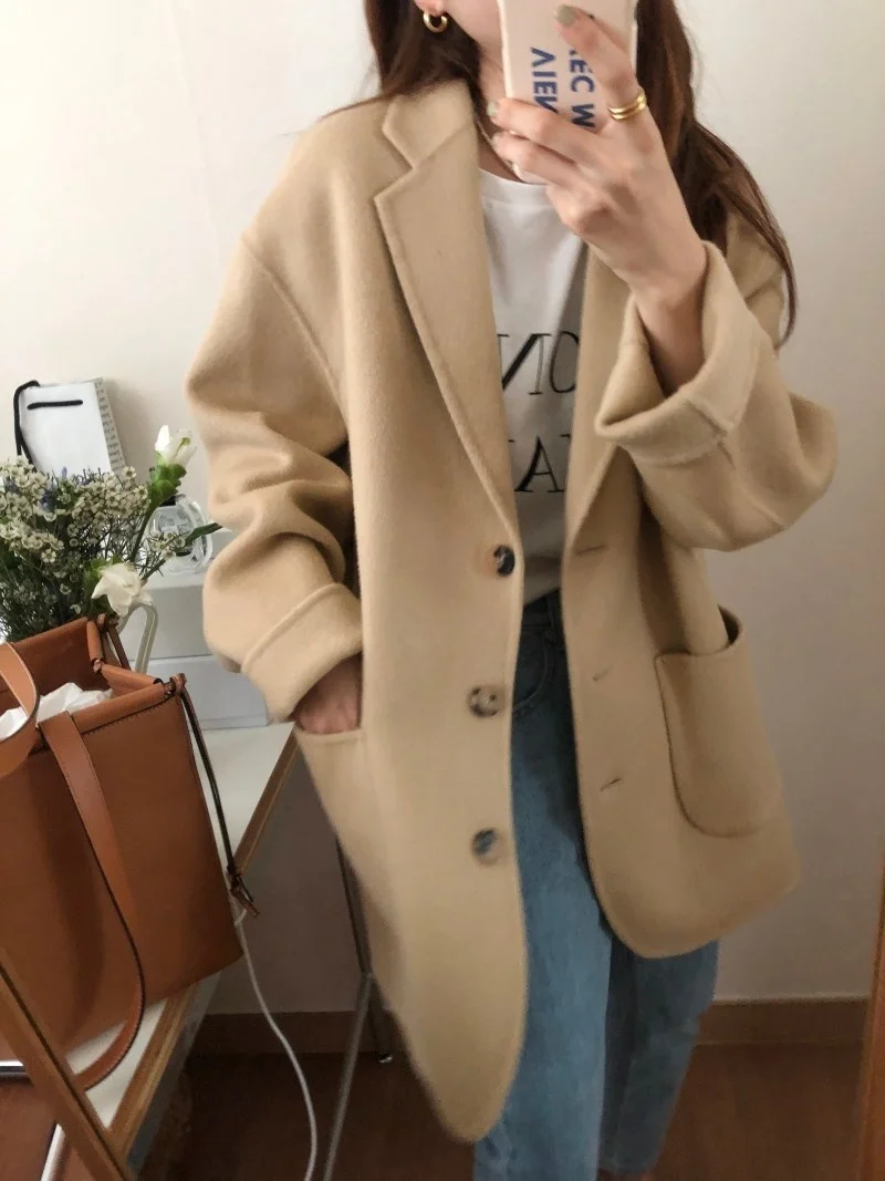 Korean Temperament Lapel Three Button Large Pocket Loose Versatile Long Sleeve Medium Long Woolen Coat Women 2021 N106 long puffer