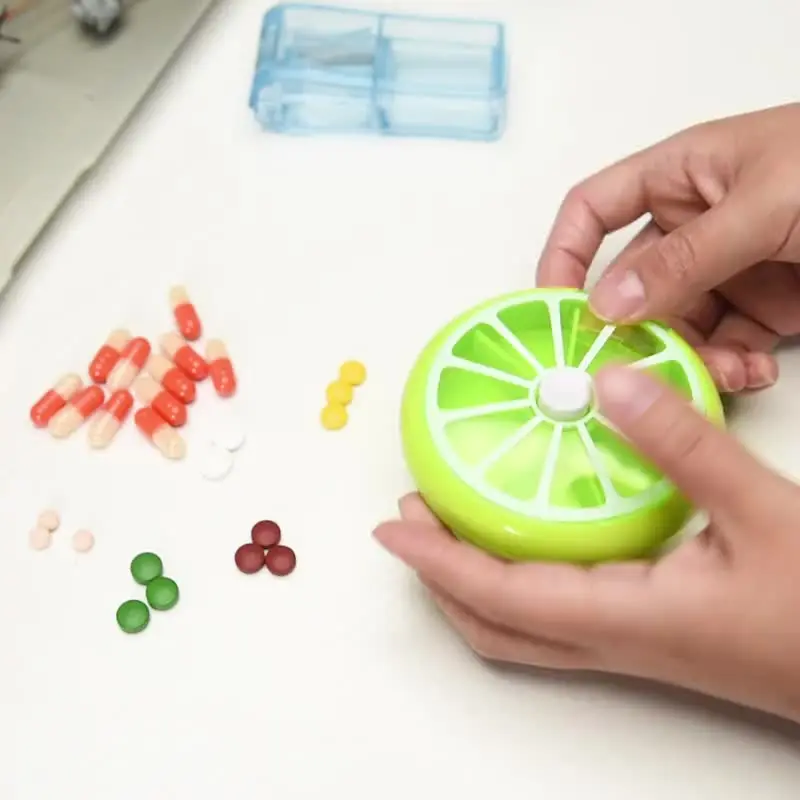 

7 day pill box organizer weekly Rotating Pill Box Case Splitter For travel Classification pills medic