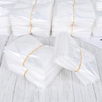 

200PCS Hairdressing Shawls PE Plastic Perm Dye Hair Shawl Waterproof Haircut Neckerchief Disposable Hair Cutting Apron for Salon