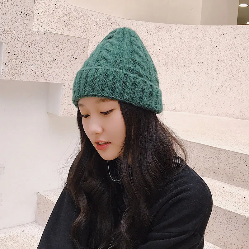 New trend hat wool hat Korean version of the wild outdoor thick warm knitted hat pure color twist hat