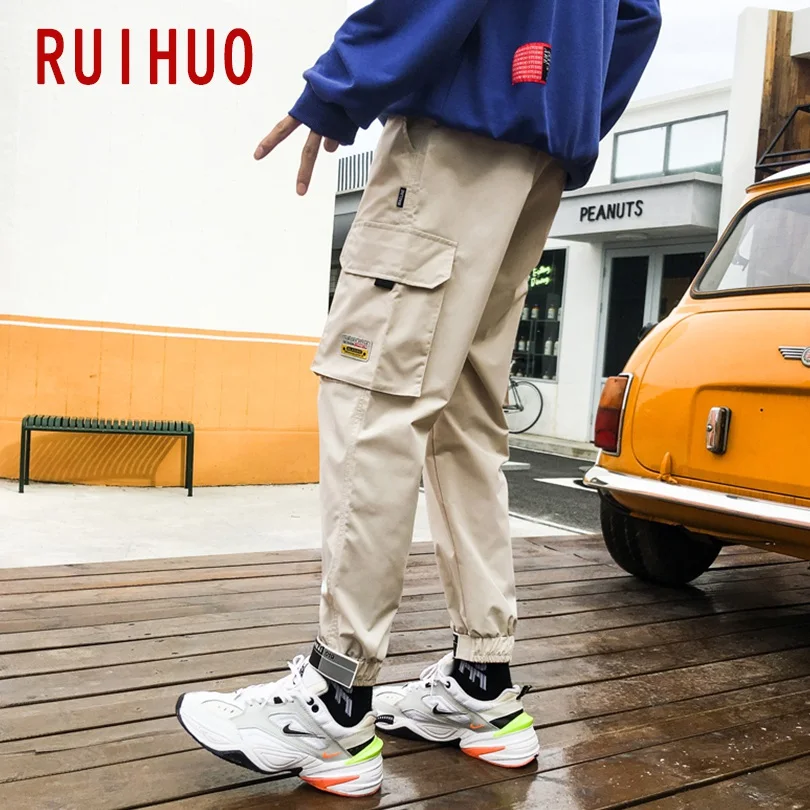 RUIHUO лодыжки-Длина грузовой Штаны Для мужчин в уличном стиле, шаровары, штаны, мужские брюки джоггеры Для мужчин Штаны в стиле «хип-хоп» впитывает пот и Штаны 5XL Новинка осени