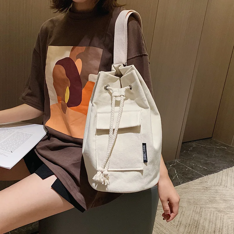 

2020 leisure drawstring open bucket bag lazy wind solid color canvas messenger bag student fashion stitching shoulder bag