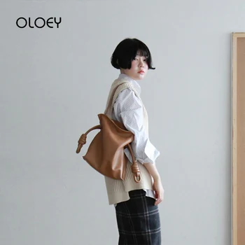 

2019 New Japanese Style Shoulder Bag Women Handbags Winding Rope Knot Shrink Bucket Bag Casual Fashion Lady Messenger Bags Bolso