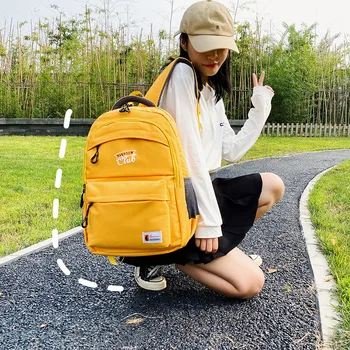 

2020 new backpack junior high school student schoolbag Korean version large capacity backpack female trend simple travel bag