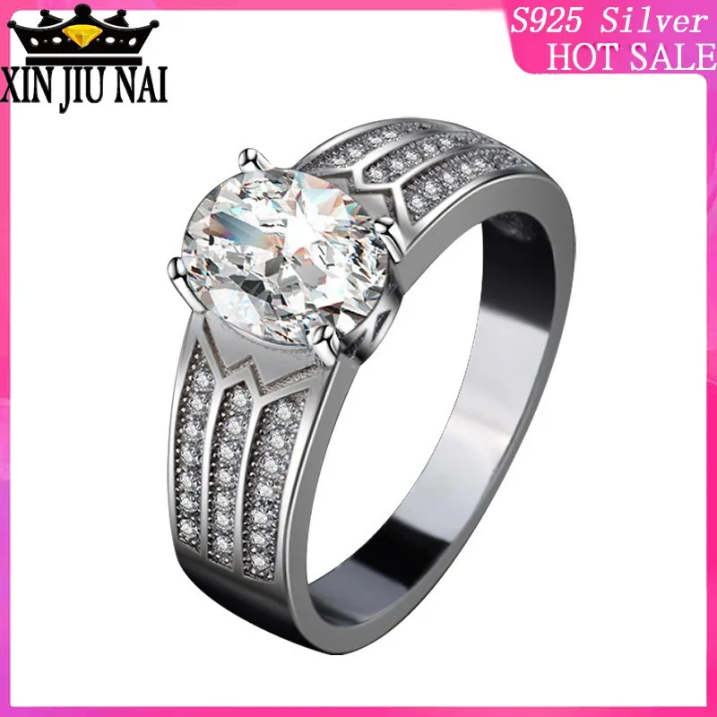 

925 sterling silver Neutral retro pigeon egg-shaped stone inlaid with three rows of women's diamond ring refers tanzanite