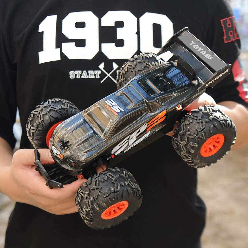 Günstige RC Auto 2,4G 1 18 Monster Truck Auto Fernbedienung Spielzeug Controller Modell Geländewagen Lkw 15 KM H radio Control Auto spielzeug autos