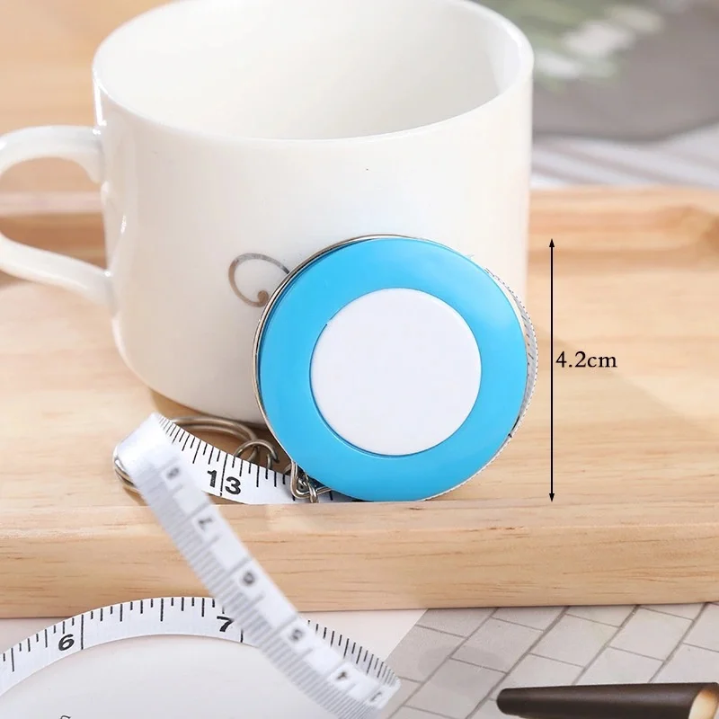 Description Picture 3 of item1PCS 150cm/60" Tape Measures Portable Retractable Ruler Mini Candy Color keychain Children Ruler Centimeter Inch Roll Tape