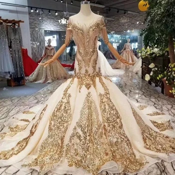 شراءفستان زفاف ذهبي فاخر مصنوع يدويًا دانتيل مطرز حورية البحر فستان زفاف بذيل طويل