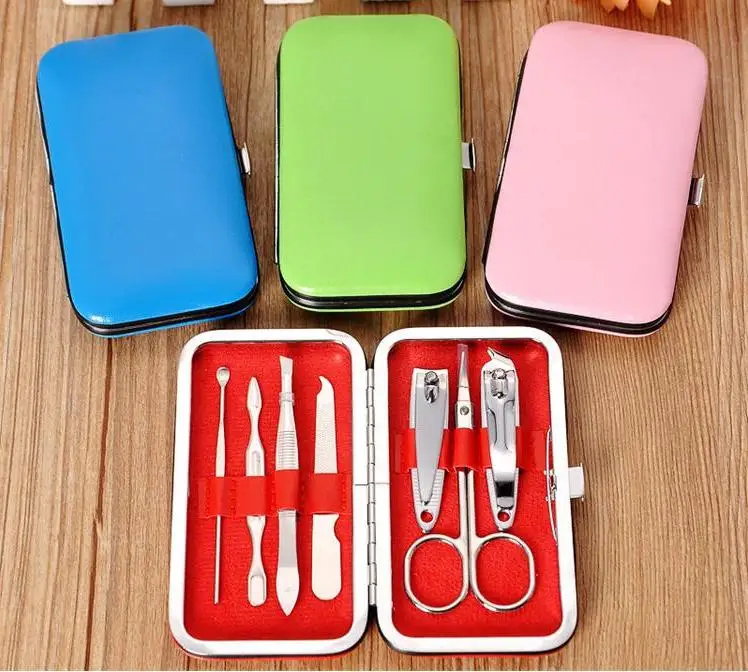 

7pcs Nail Clippers Kit Scissors Tweezer Knife Ear Pick Utility Manicure Set Tools Gifts Random Colors Wholesale