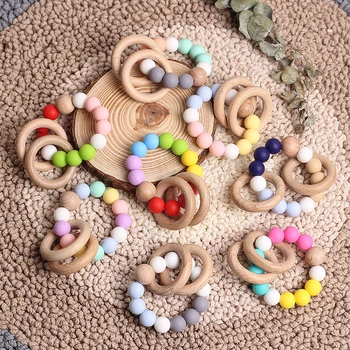 

Wooden Waldorf Toy baby toys Food Grade pacifier clips Beads Wooden Pacifier Chain Wooden Pacifier for Newborn Babies