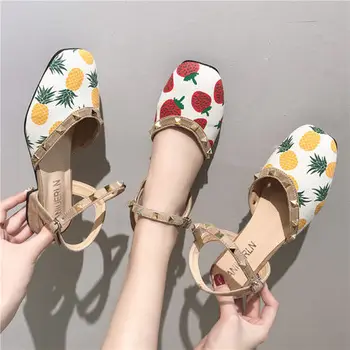 

2020 spring and summer new ins flat toe sandals female fairy style wild pineapple low heel thick heel rivet Roman shoes