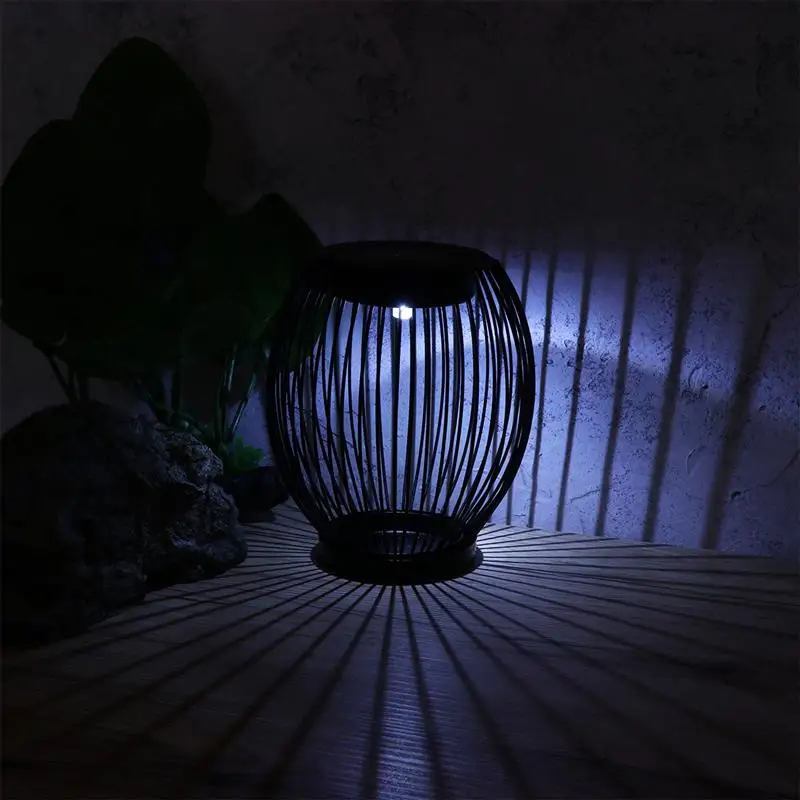 

Portable Iron Solar Energy Courtyard Lantern Decorative Hollow Cage Landscape Lamp For Yard Lawn Home