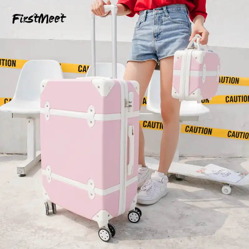 pink rolling luggage