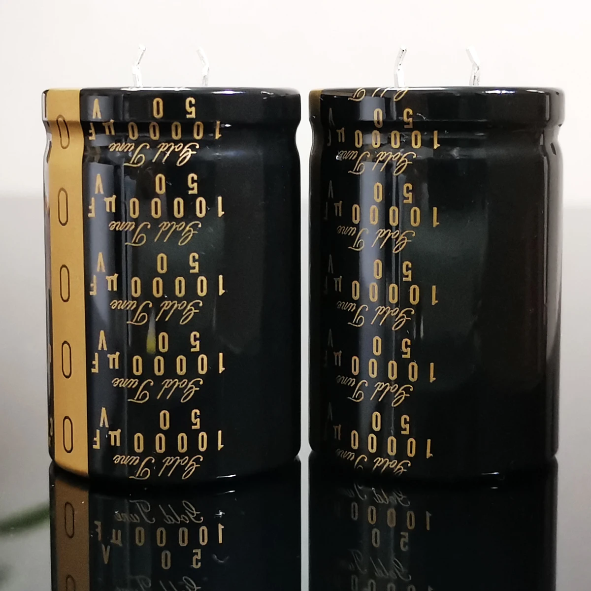 one pair 4700uf 63v 35x50mm nichicon kg type ii gold tune pitch 10mm 63v 4700uf audio electrolytic capacitor alloy feet 2pcs/lot Original Japanese Nichicon KG TYPE series fever capacitor audio electrolytic capacitor free shipping