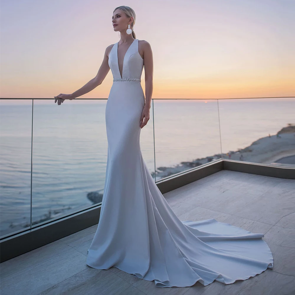 

Modest Mermaid Wedding Dresses Sexy V-neck Sleeveless Backless Ivory White Wedding Gowns with Crystail Vestido de Novia