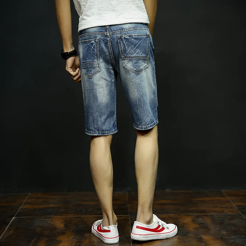 Красивые Летние популярные мужские джинсовые шорты, модные облегающие эластичные хлопковые синие потертые рваные джинсы, Мужская брендовая одежда