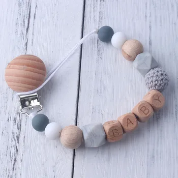 

Personalized Baby Name Beech Wood Chew Beads Pacifier Clips Dummy Chain Holder Cute Soother Chains Baby Teething Toy Baby Chew