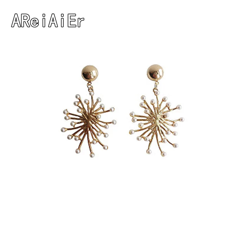 

Europe and the United States retro metal pearl earrings fireworks burst jellyfish shape design exaggerated ear clip earrings