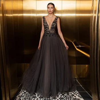 

Best Selling Sexy Deep V Neck Sequin Beading Sleeveless Illusion Bodice Black Tulle Long Evening Dress