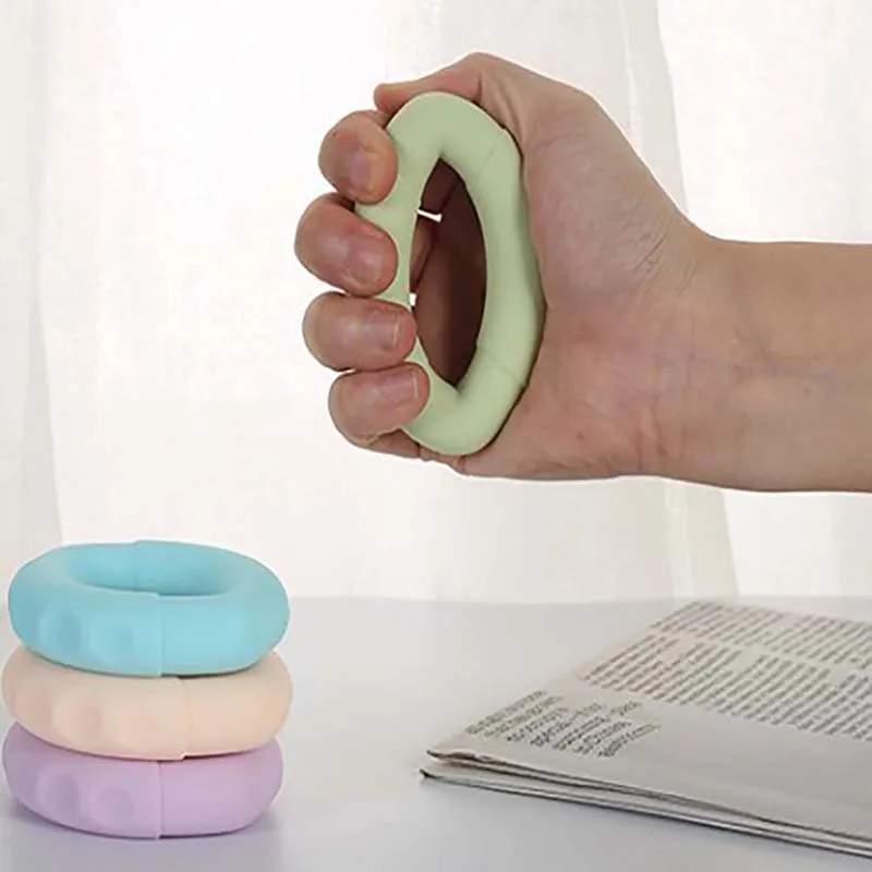 

Silicone Finger Gripper Resistance Band Ring Wrist Stretcher Forearm Trainer