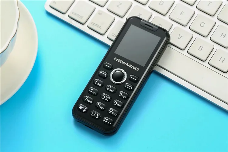 Newmind K2 нажимная Мини-кнопка расположение мобильного телефона 1,44 дюймов экран MP3 фонарик камера SOS дешевый телефон для пожилых детей - Цвет: Black