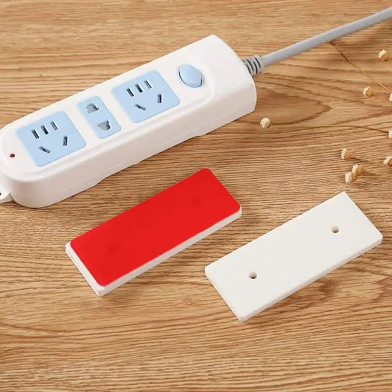 

1Pcs Wall Mount Free of Punch Seamless Power Strip Fixator Non-trace Plug Board Socket Wall Holder for Fixed Socket Tissue Box