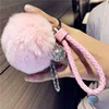 Moelleux réel lapin fourrure porte-clés pompon balle en cuir porte-clés porte-clé charme femmes sac voiture pendentif bijoux bibelot accessoires ► Photo 2/6