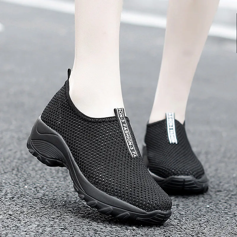 flat black trainers womens