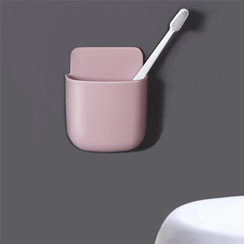 Perforated wall-mounted remote control toothbrush holder practical simple home bedroom convenient remote control hanging shelf