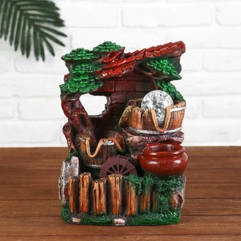 

Fountain "House by the Fence" 13 * 17 * 25 cm (backlit) 4557781