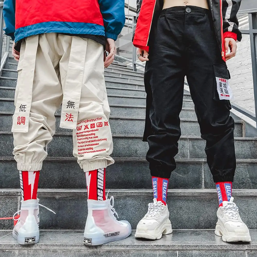 Price AELFRIC Chinese Letter Embroidery Ribbons Casual Pants Men Trouser 2018 Autumn Winter Harajuku Harem Joggers Sweatpants KJ170