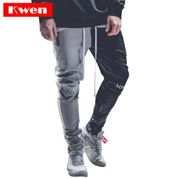 

2019 July Stitching color Men Bodybuilding Gyms Pants Runners Clothing Sweatpants Pant Side Stripe Hip Pop Style Streetwear