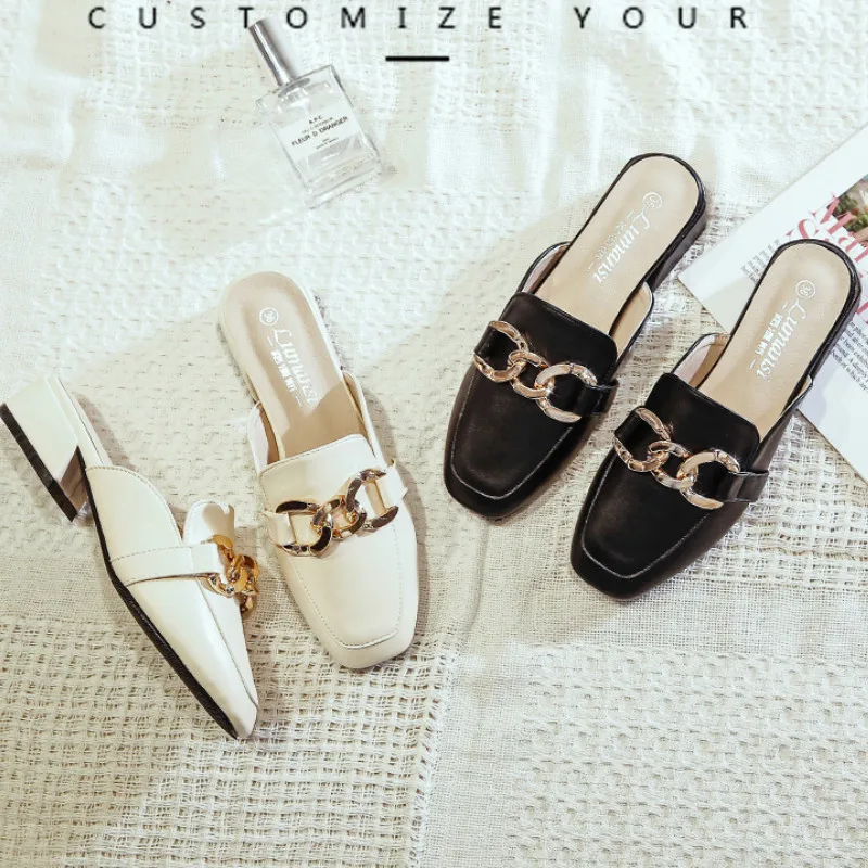 black flat mule slides