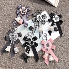 Корейский стиль мода лук Камелия кисточкой брелок xiang zuan bao пакет подвеска автомобиль брелок для ключей автомобиля подвеска