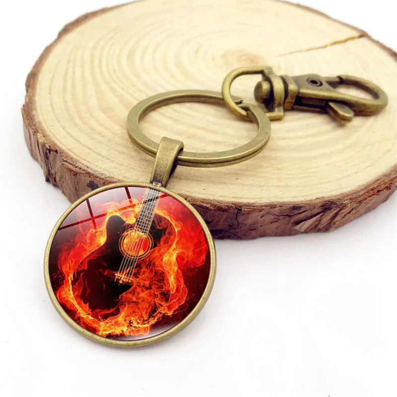 

Hot Sales Rock And Roll Band Guitar Pendant Keychain Time Stone Key Ring Supply of Goods