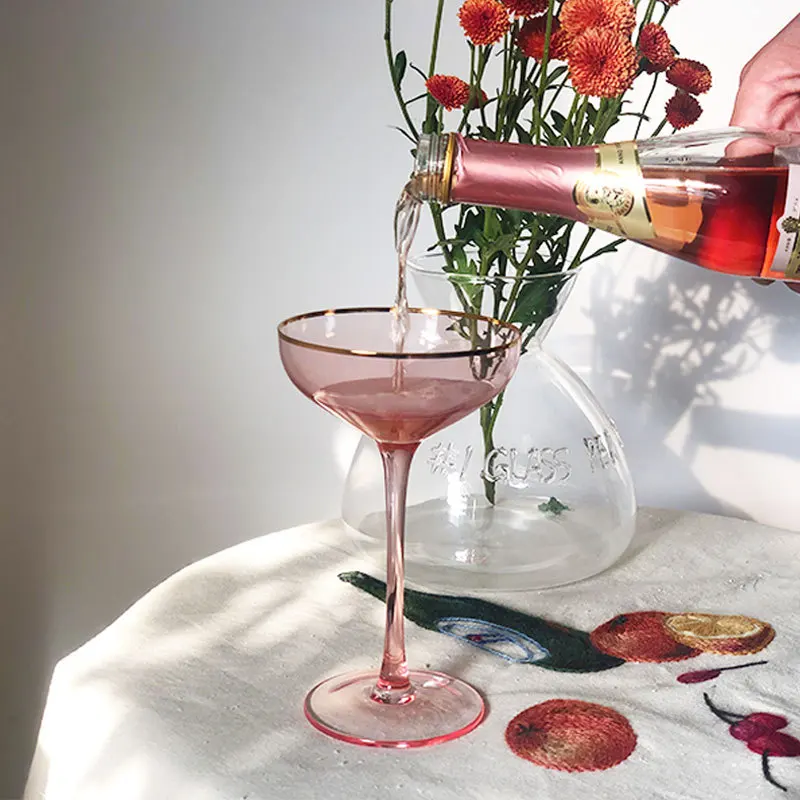 https://ae01.alicdn.com/kf/H665ac3a06984494da2cc98a6e2c6ddbaN/Cocktail-Crystal-Champagne-Wine-Glasses-Parties-Transparent-Golden-Side-Pink-Goblet-Glass-Dessert-Cup-Bar-Barware.jpg