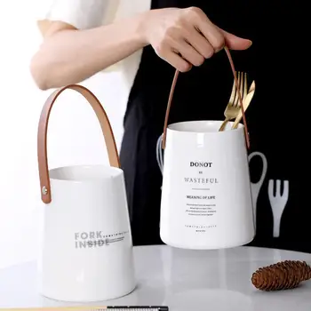 

Unique Chic Nordic Ceramics Storage Jar Bottle With Leather Handle Minimalist Desk Storage Bottle Organizer Flower Vase Bottle